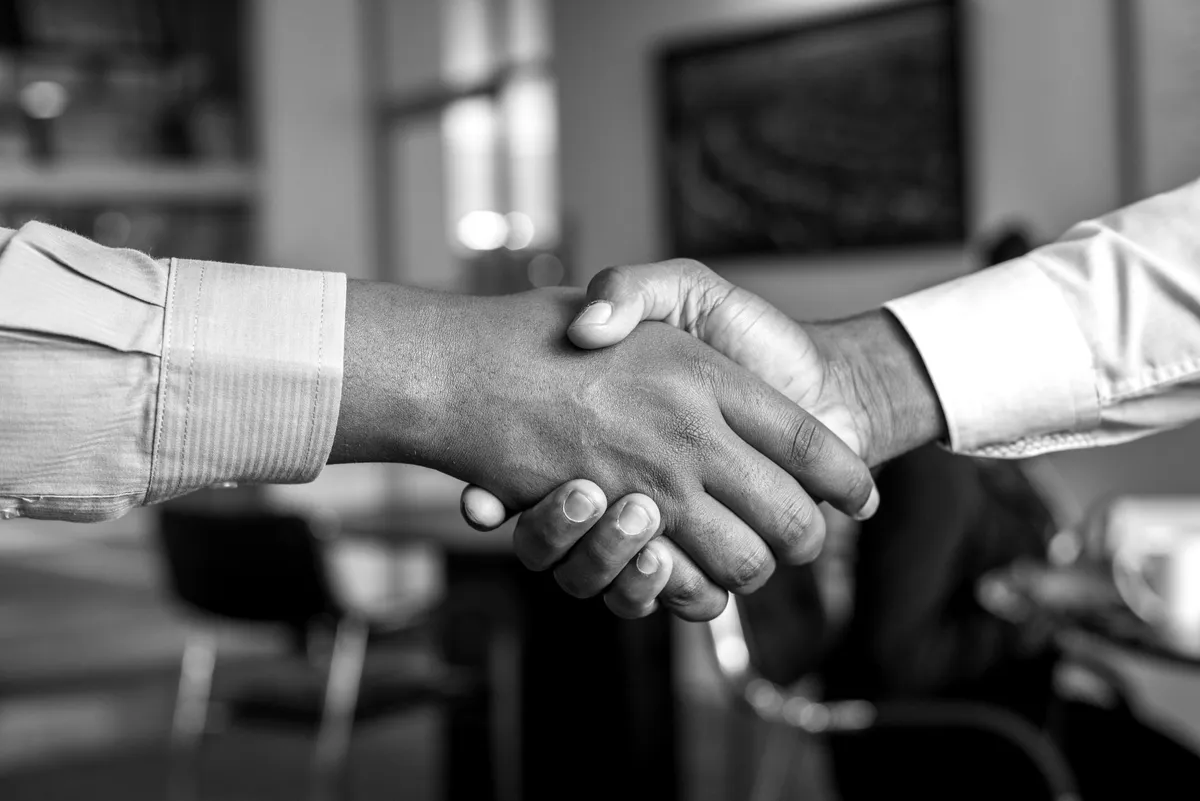 Two people shaking hands