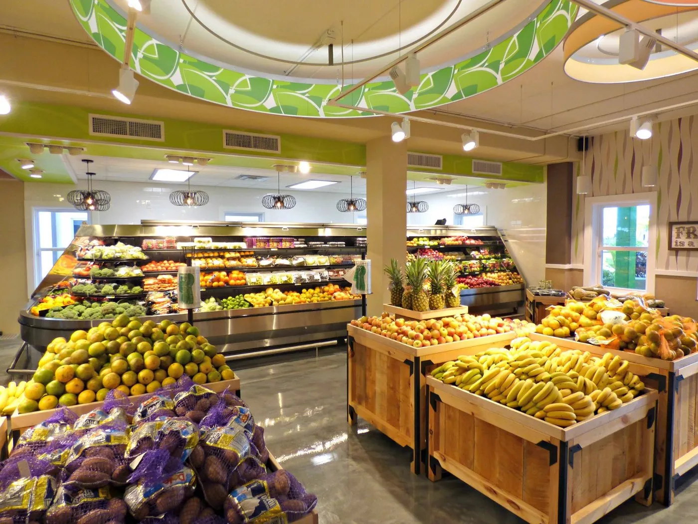 Produce displays inside the Massy fresh market at Coverley, Barbados
