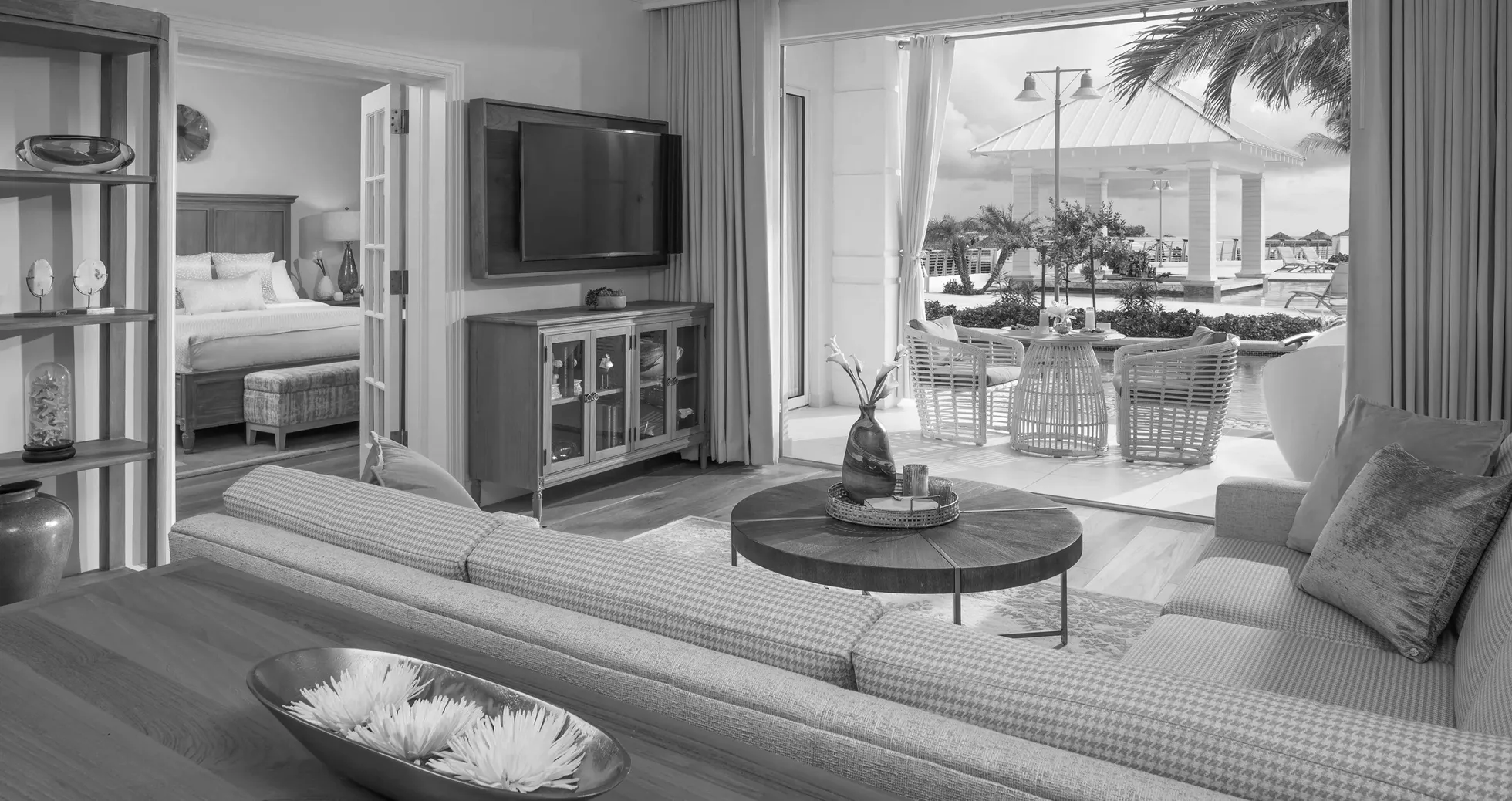 Suite living area opening onto a covered terrace