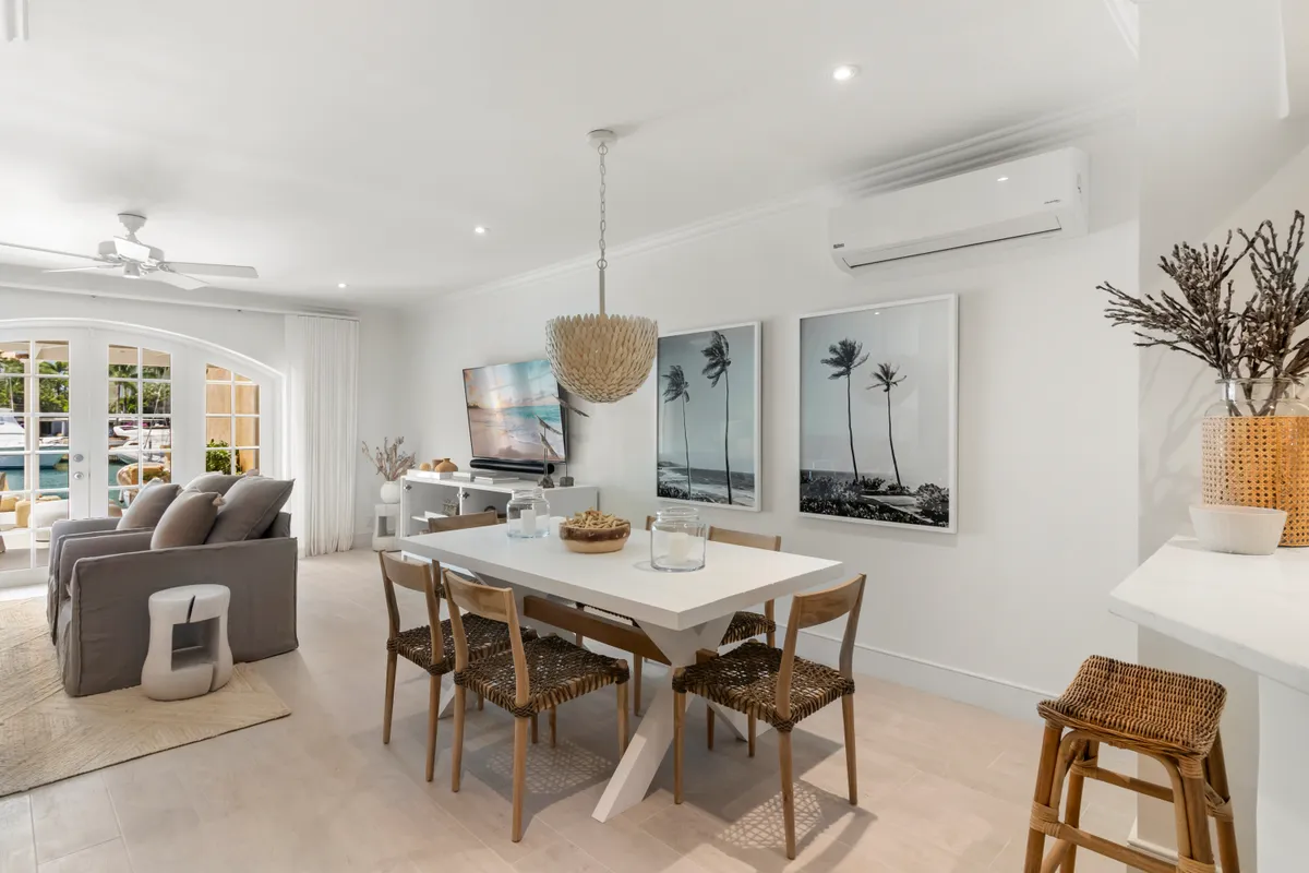Open-plan living and dining room in a coastal villa